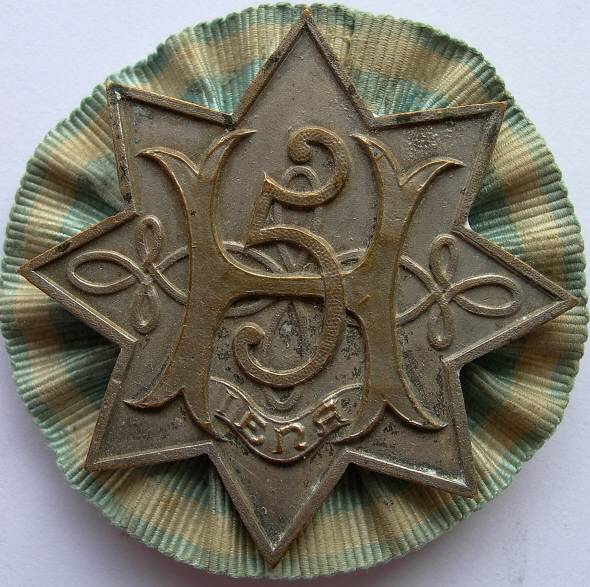 Insigne de l'association IÉNA en 1910